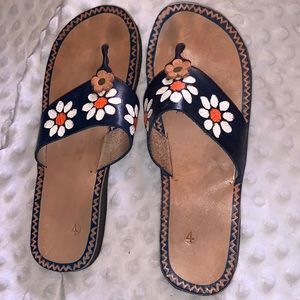Cute leather “daisy” embellished flip flops